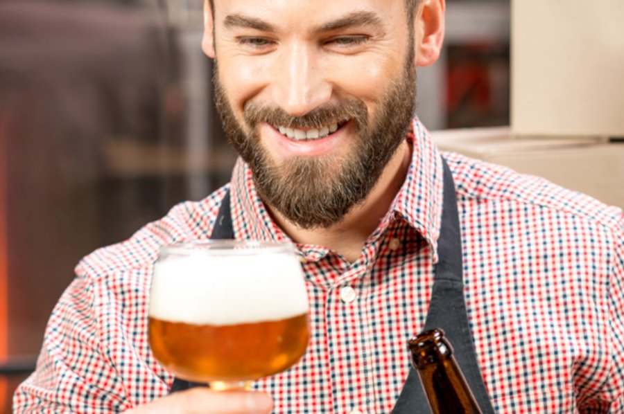 Hero Image Man with glass of beer and bottle