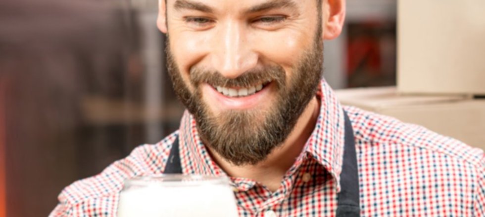 Hero Image Man with glass of beer and bottle